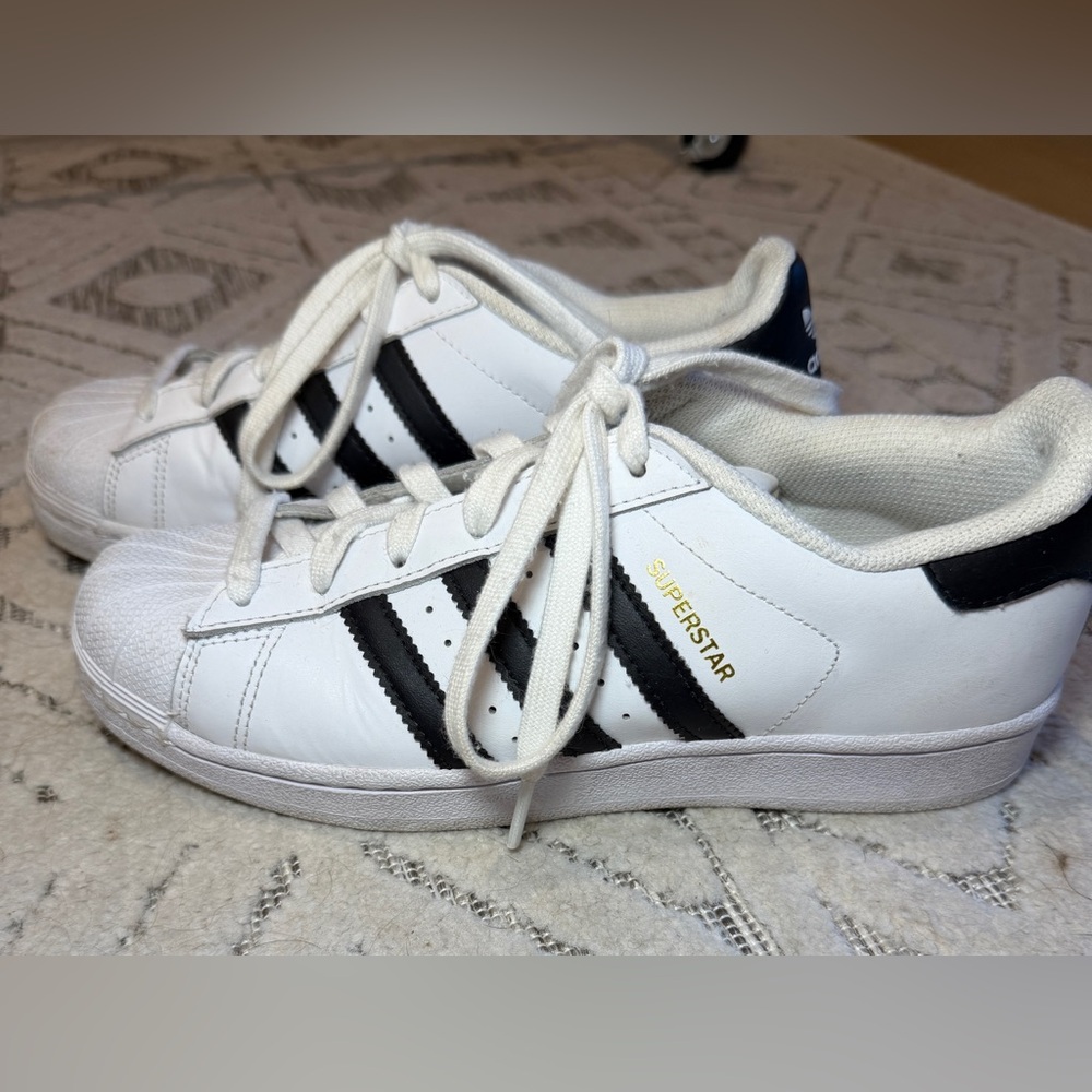 adidas White Sneakers with Black Stripes and Gold Accent
